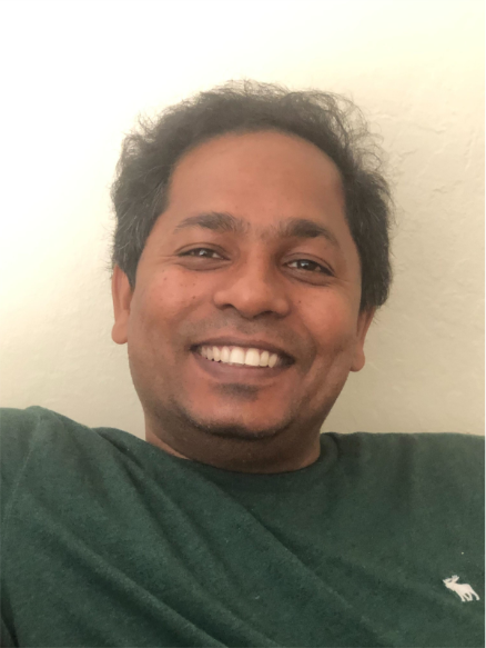 A person smiling at the camera AI-generated content may be incorrect.