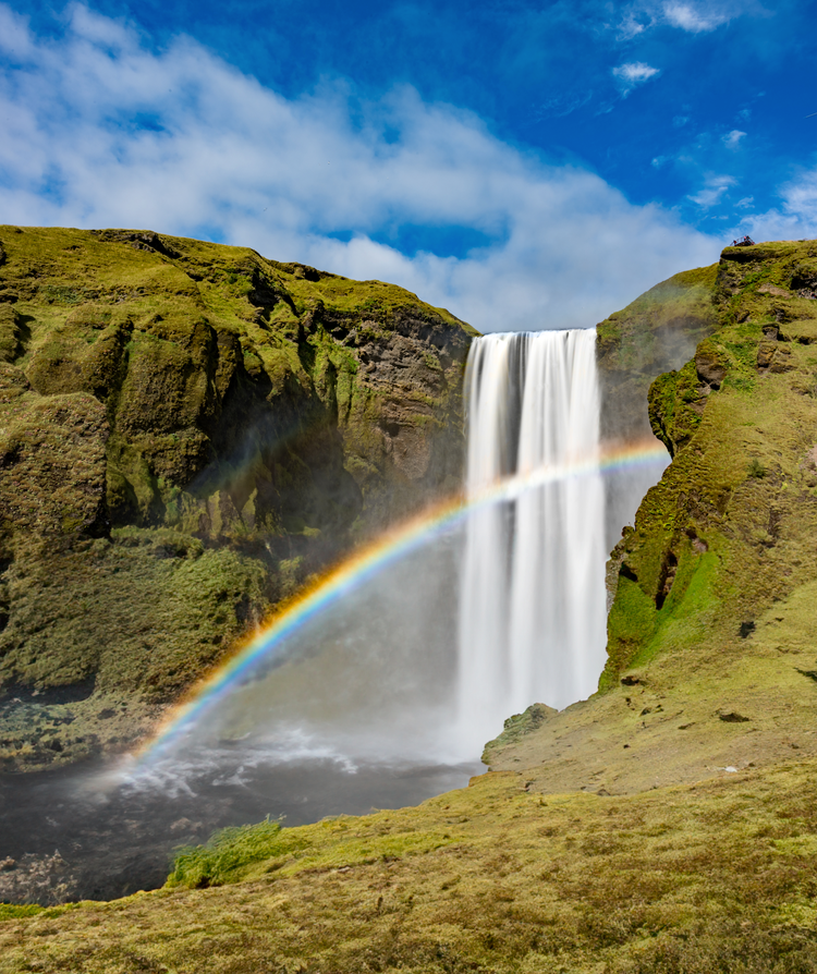 Image of a waterfall and rainbow.