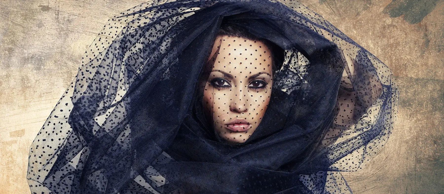 Beautiful woman under the black veil