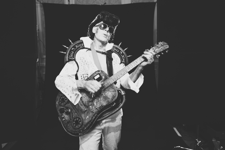 A man plays guitar