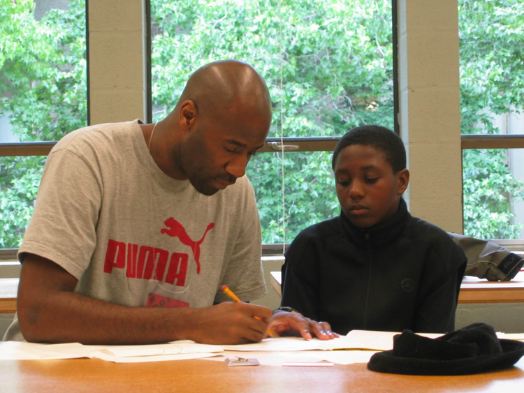 Founder Maurice Woods tutoring a student. 