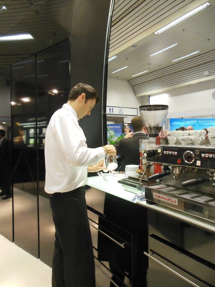 Barista coffee, served hot at the Adobe booth