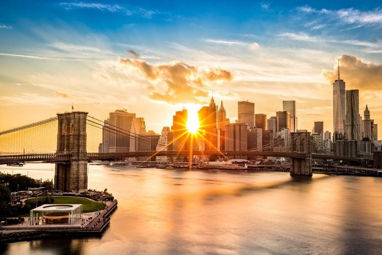 Brooklyn Bridge and the Lower Manhattan skyline at sunset, as viewed from Manhattan Bridge