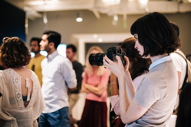 Woman taking photo at Sundance Film Festical