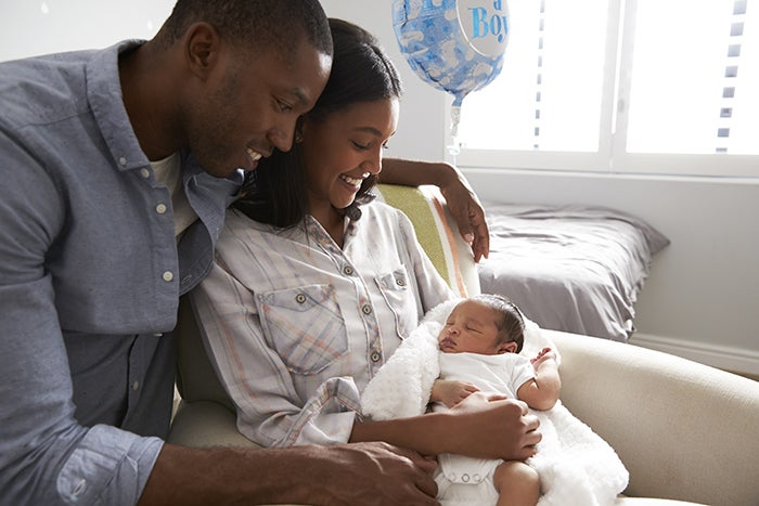 Couple with newborn baby.