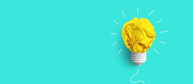 Creativity inspiration,ideas concepts with lightbulb from paper crumpled ball on pastel color background.