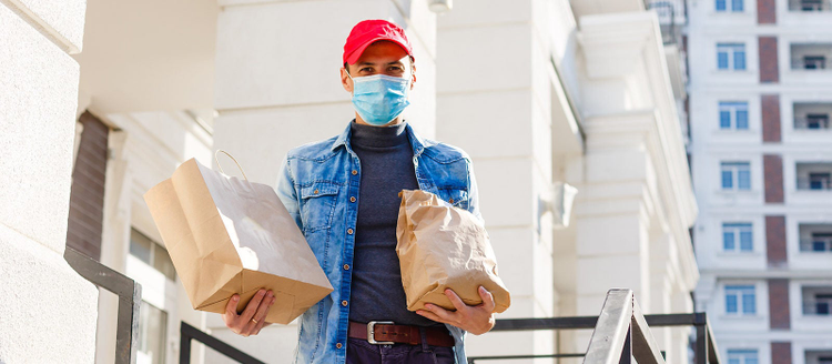 delivery man in protective mask