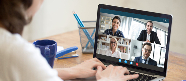 Diverse people take part in group video call.