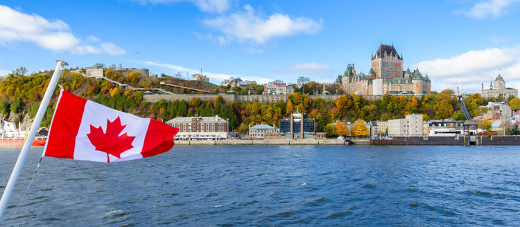 Panoramic view of Old Quebec City waterfront and Upper Town from Saint-Lawrence River in Quebec, Canada