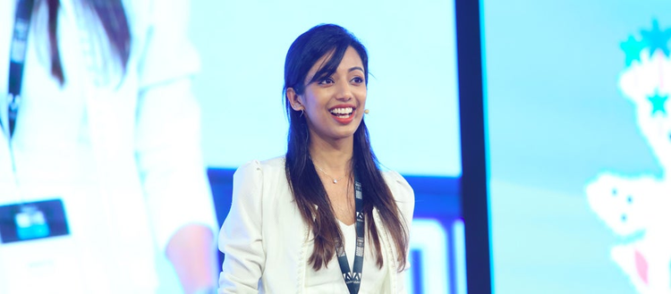 Nikhita on stage at the 2019 Adobe For All Summit.