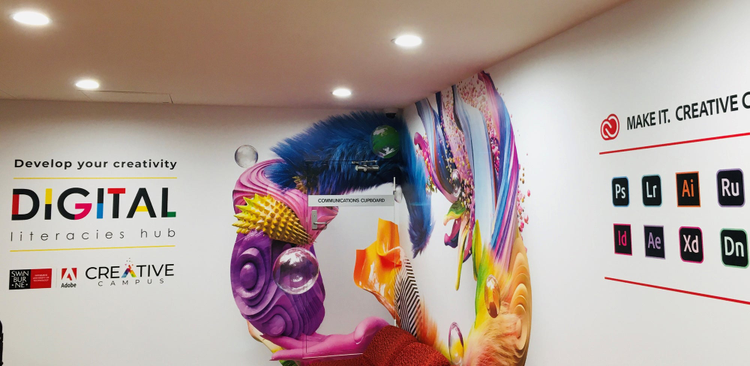 Room with "develop your creativity" banners on the walls.