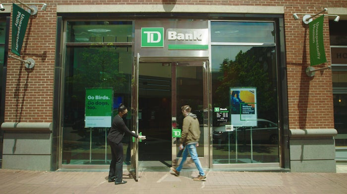 Man walks into TD Bank.