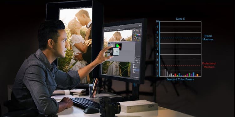 A man working with color on a computer