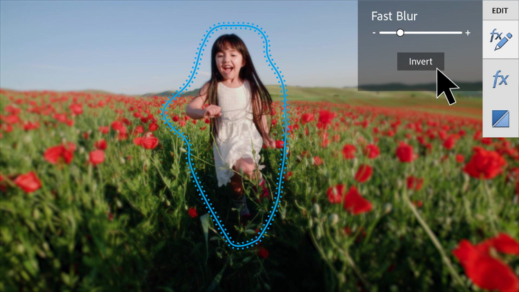 girl running through flower field