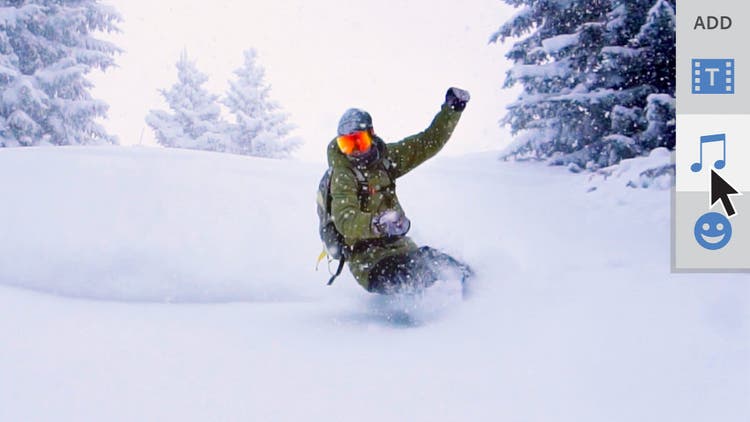person snowboarding down hill