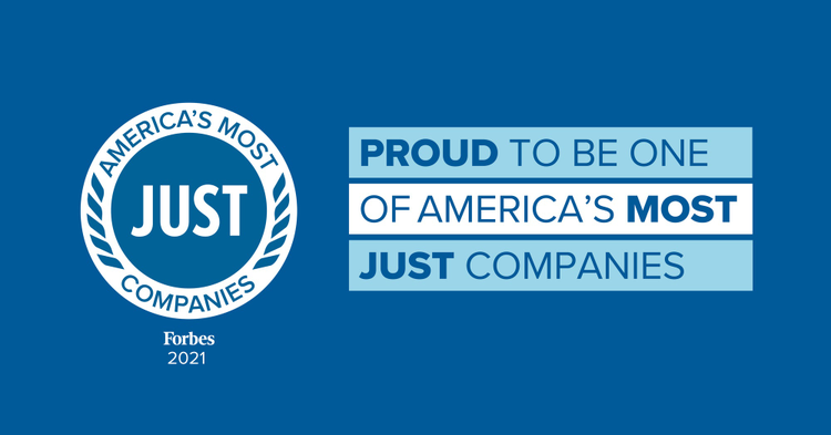 Blue background. On the left is a white crest that reads America's Most JUST Companies, Forbes 2021. On the right is text that reads "Proud to be one of America's Most JUST Companies." 