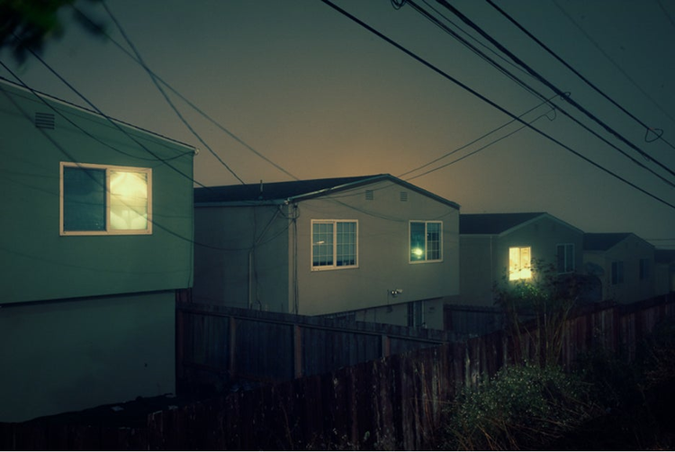 View of houses at night.