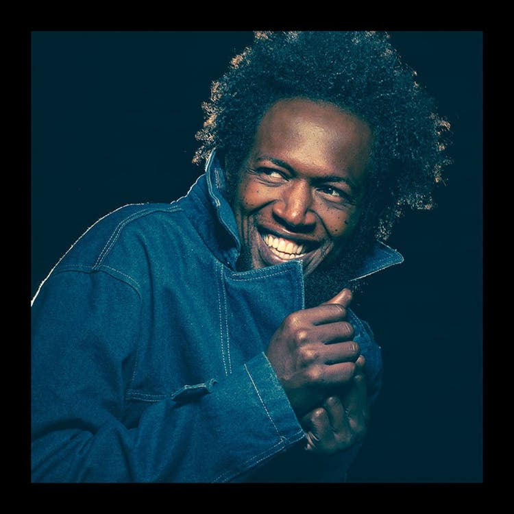 Image of man in denim jacket.