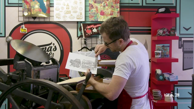 Man running letterpress.