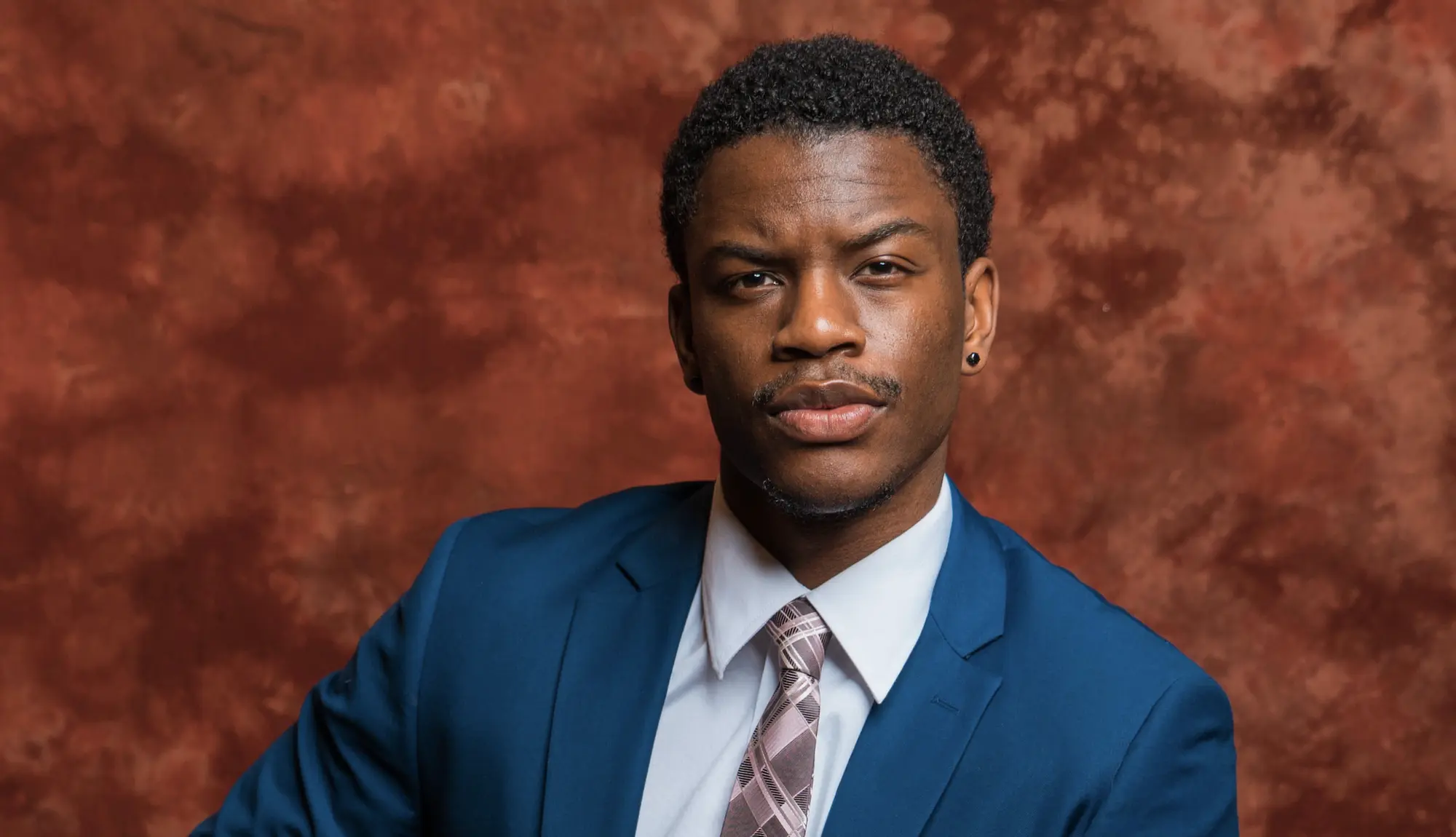 Adobe employee Isaiah Everett, financial analyst and photographer.