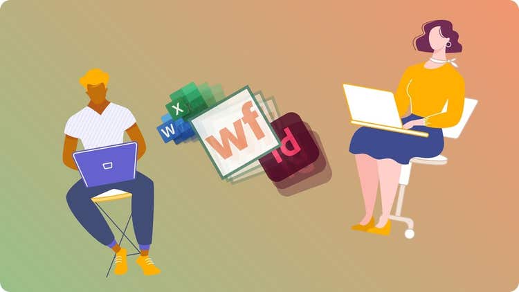 Man and woman working on laptops.