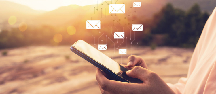 Woman emailing with smartphone.