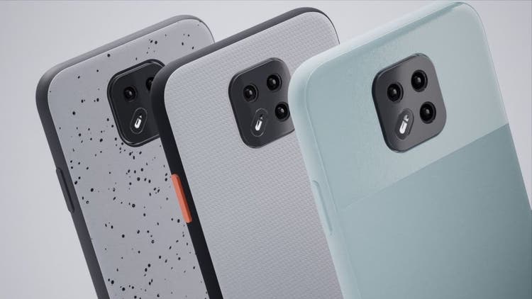 Picture of 3 phones and their cameras over a gray background