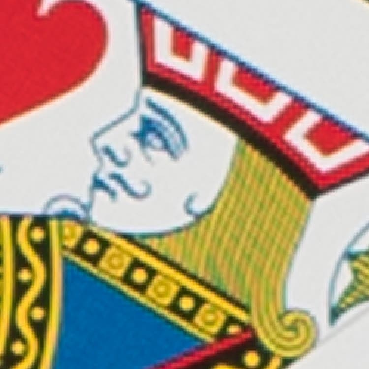 Close up image of a playing card with a jack that is pixelated.
