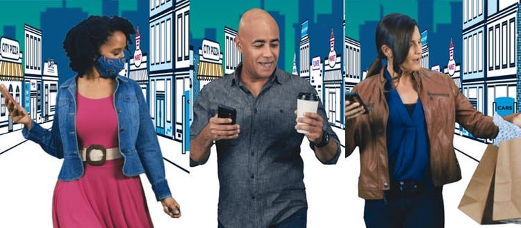 Photo of 3 people carrying props.