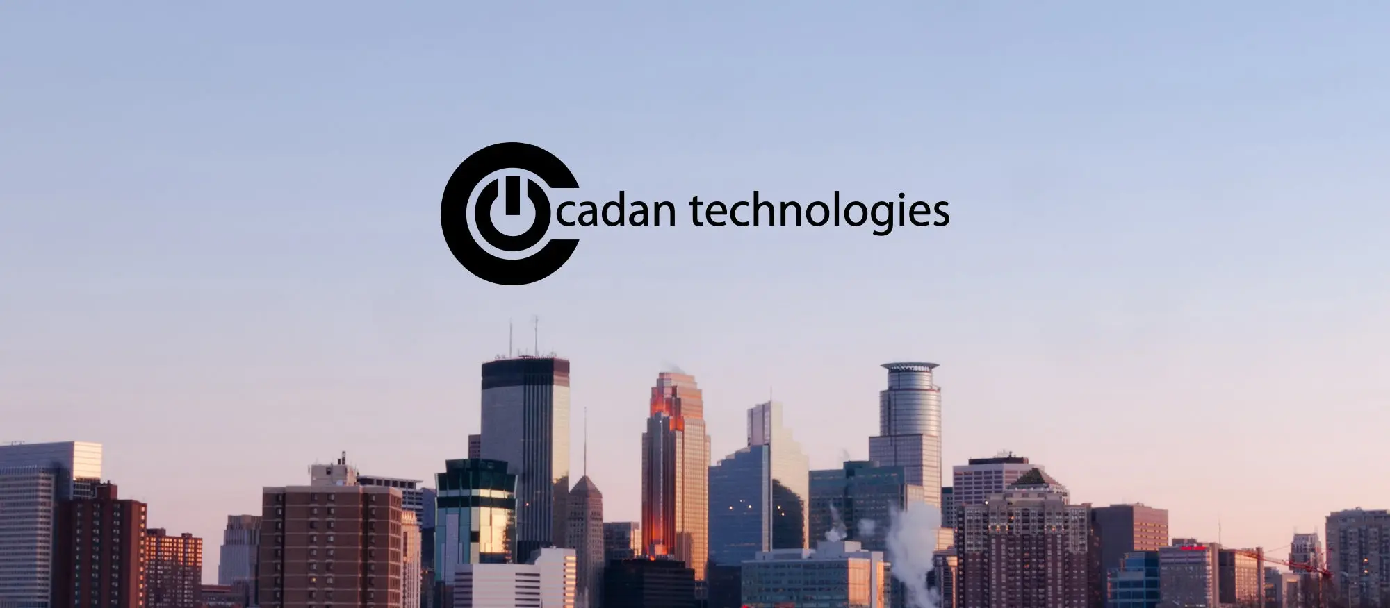 Illustration of a cityscape with Cadan technologies written on the center. 