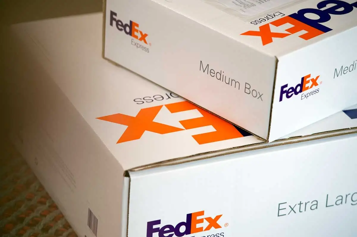 FedEx boxes stacked on eachother. 