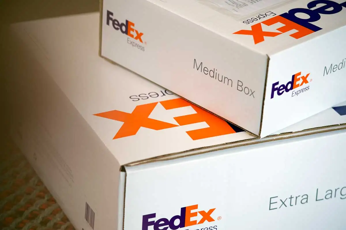 FedEx boxes stacked on eachother.