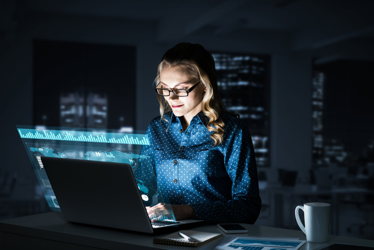 Woman working in a digitally intelligent workplace