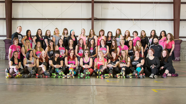 Charlotte Malan (front row, center) with her Roller Derby team. 