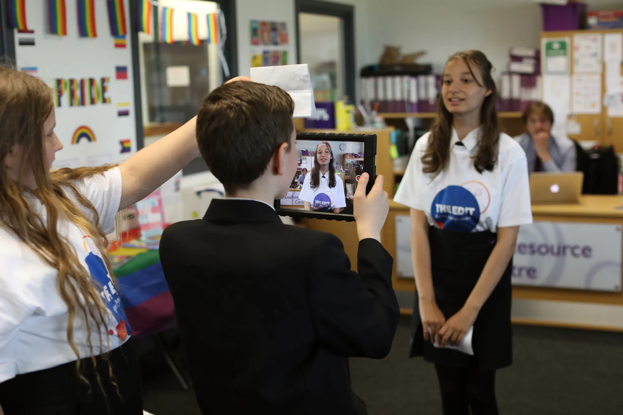 school children recording eachother