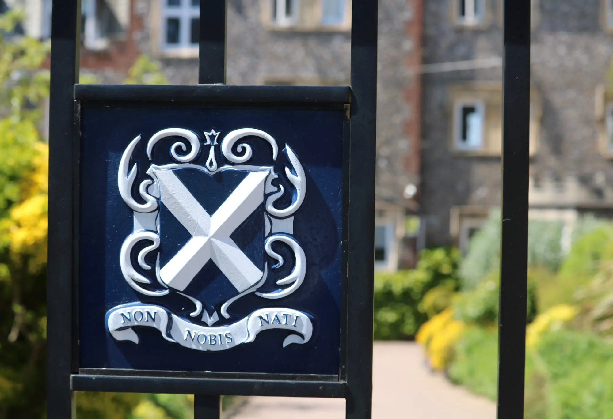 Image of an iron gate outside of St. Albans School in Hertfordshire, England. 