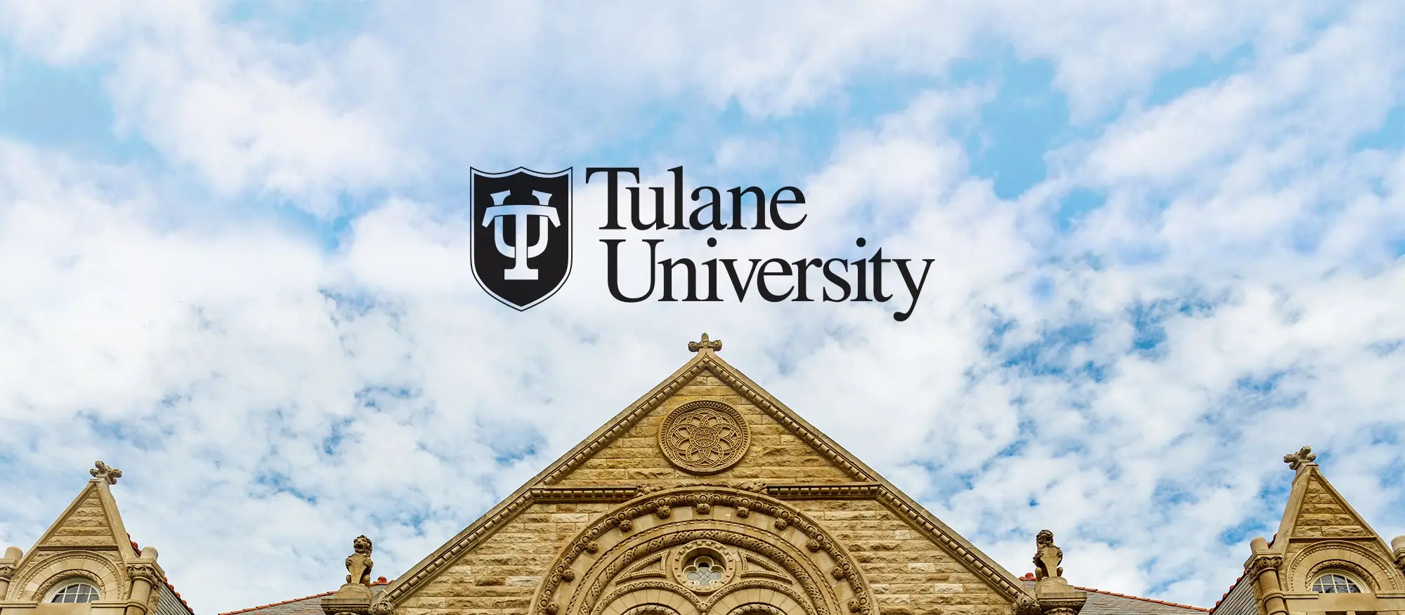 Tulane University logo against a background of clouds and blue sky.