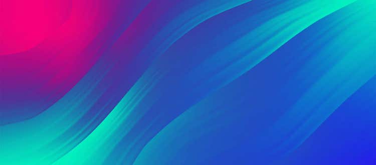 Gradient image of bright pink, greens and blues.