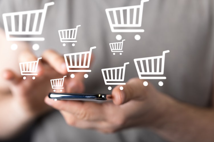 Shopping carts on a mobile device depicting online shopping.