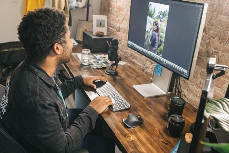 Image of Aundre Larrow editing on his desktop. 