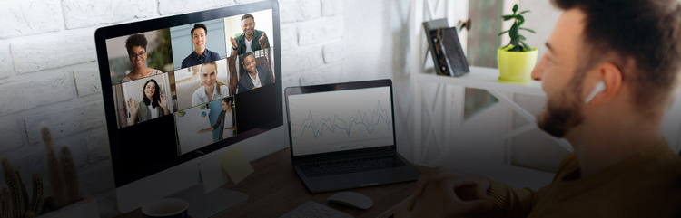 Man looking a computer screen for meeting. 