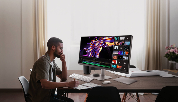 Image of a man at a creative workstation.