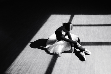 Black and white style photograph of a ballet dancer.