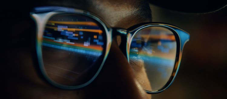 Sunglasses with a reflection in them.