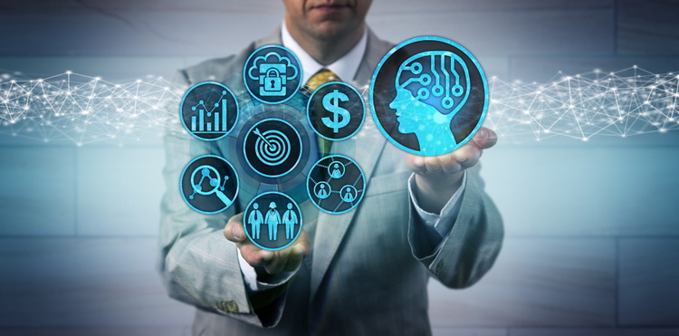 Man in suit holding graphics to represent pieces of B2B marketing