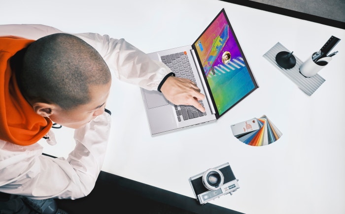 Man working on a laptop.