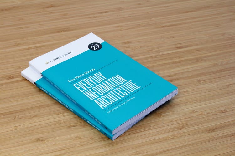 A picture of Lisa Maria Marquis’ book, Everyday Information Architecture, featuring a blue and white cover page.