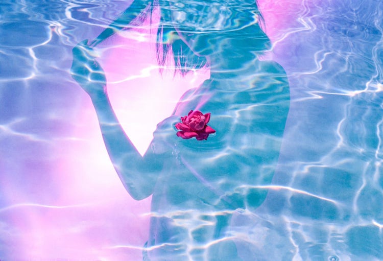 Image of lady in background with a water overlay and a flower in the middle. 
