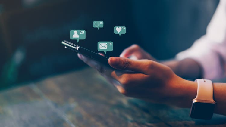 Woman hand using smartphone and show technology icon social media.