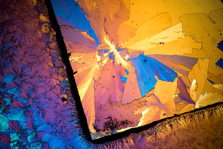 Colorful abstract image of yellow, purple and blue.
